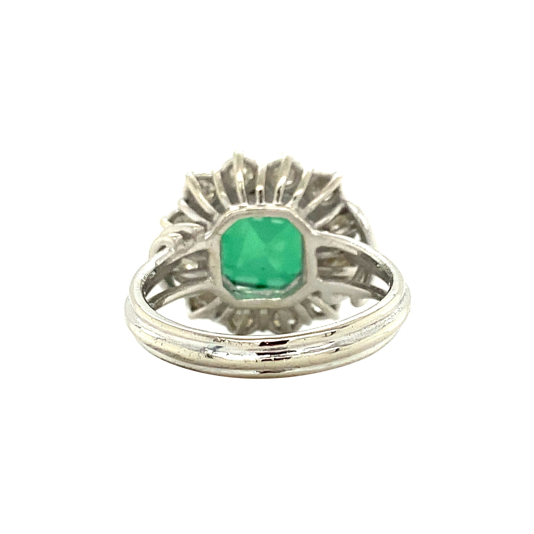 Witgouden entourage ring met diamant en groene spinel 18 krt