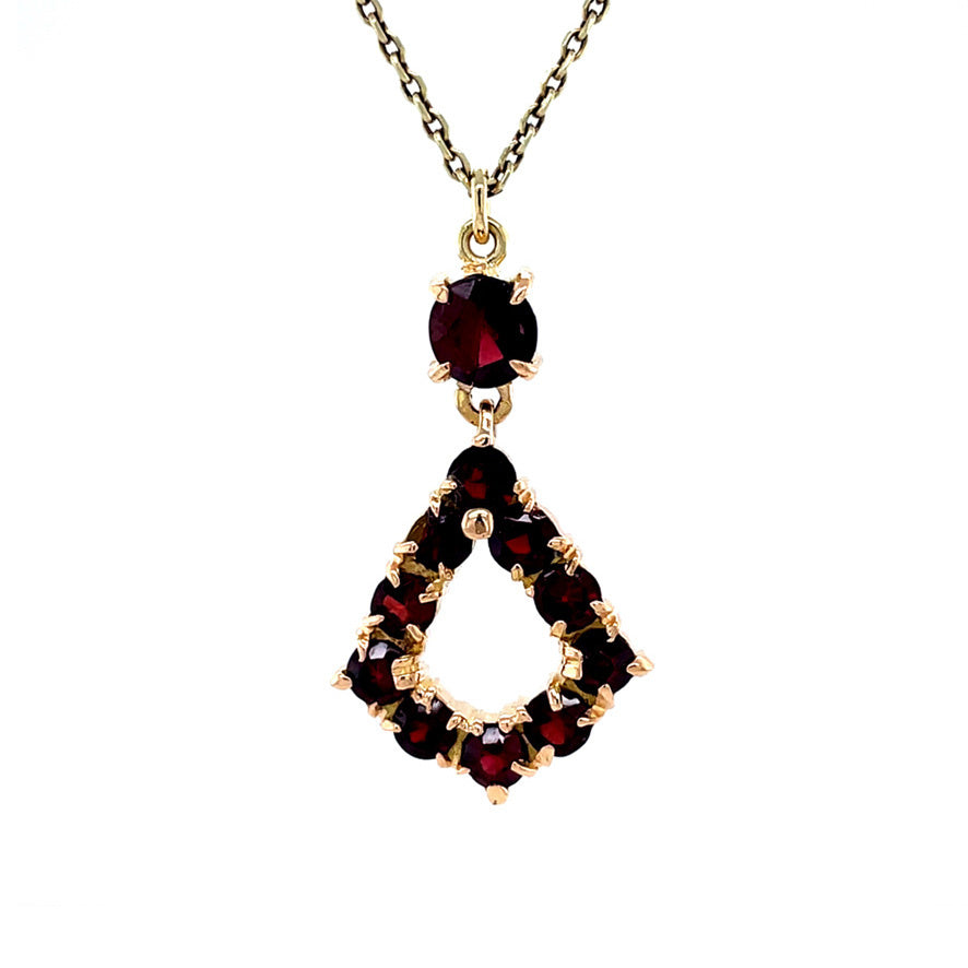 Golden vintage pendant with garnet 18 kt