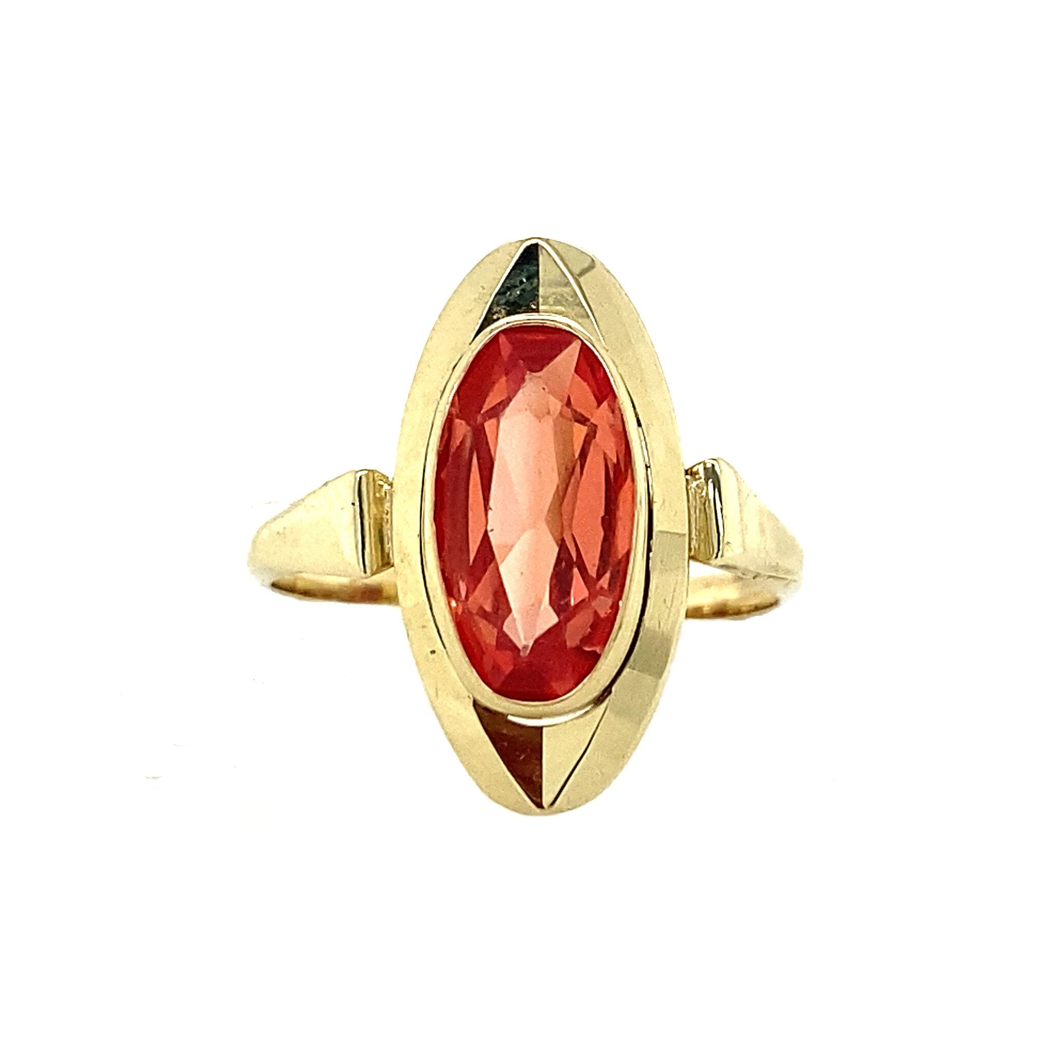 Gouden ring met oranje saffier 14 krt