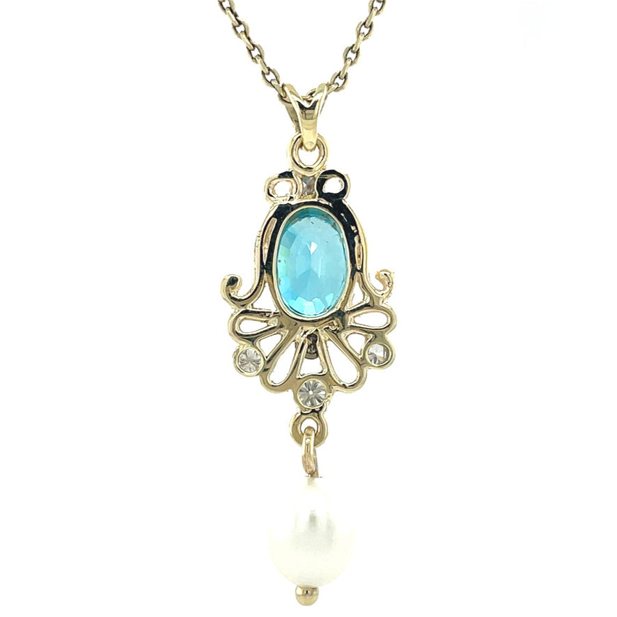 Gold vintage pendant with pearl, zirconia and diamond 14 kt