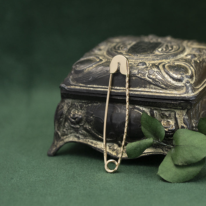 Gouden veiligheidsspeld broche 14 krt