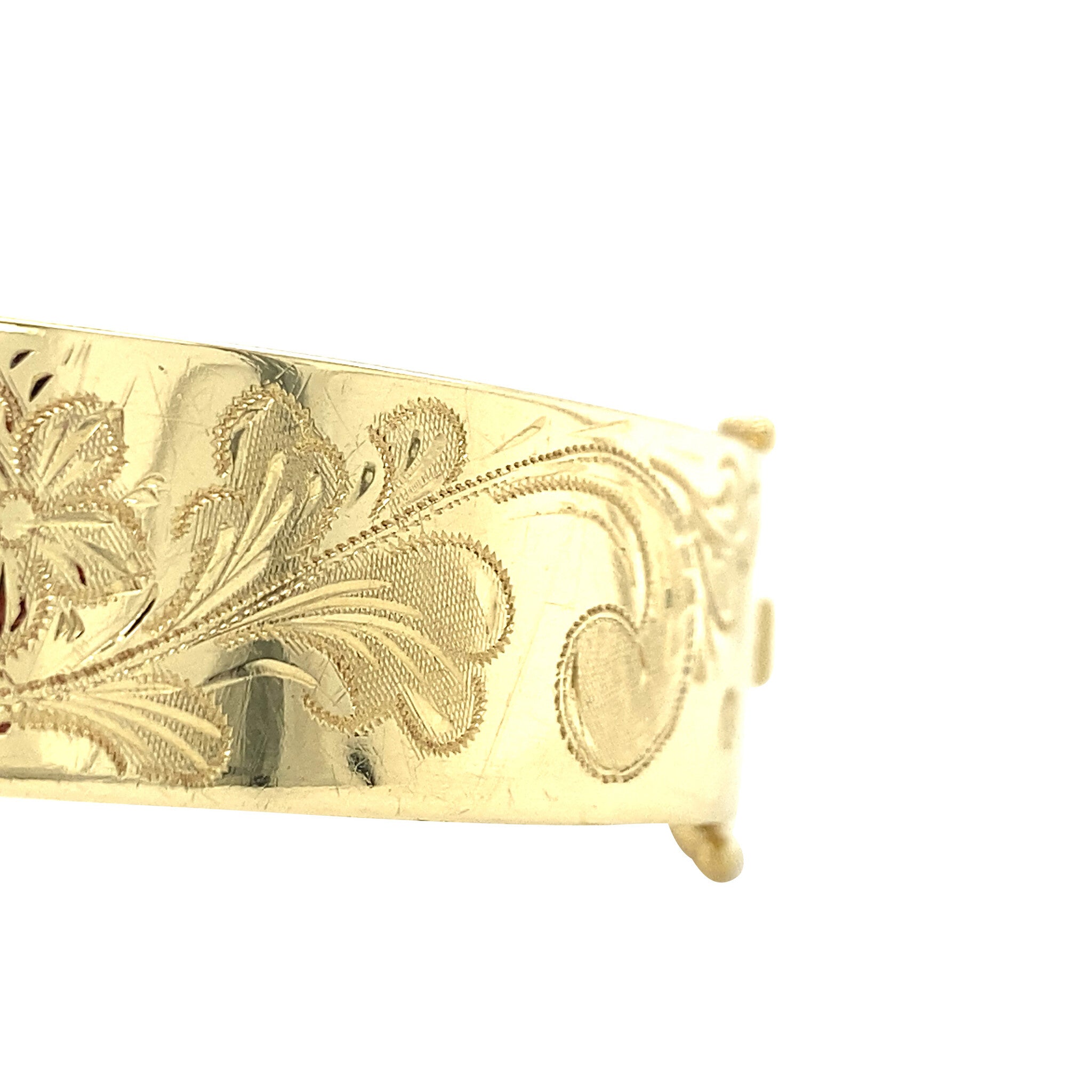 Vintage gouden bangle met gravure 14 krt