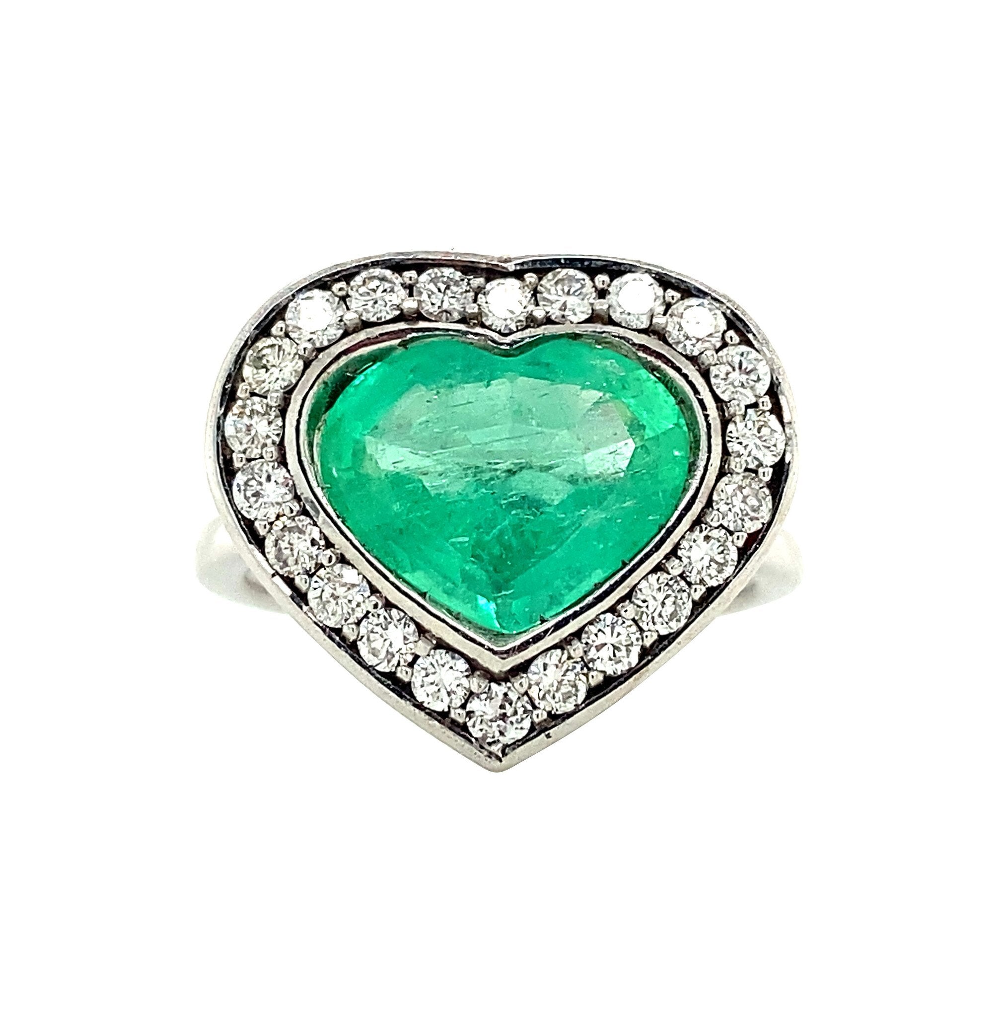 Witgouden entourage ring met smaragd en diamant 18 krt