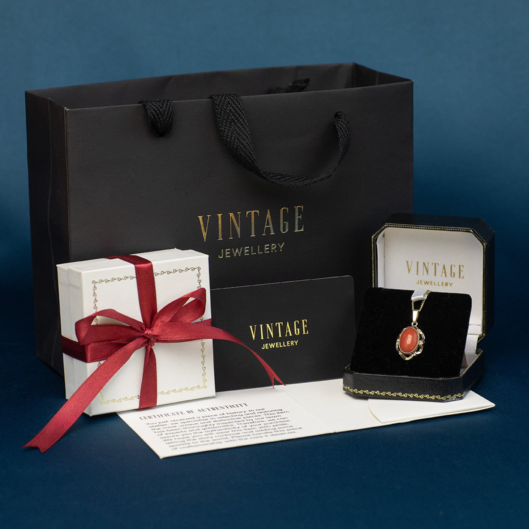 Gouden vintage hanger met granaat 14 kt