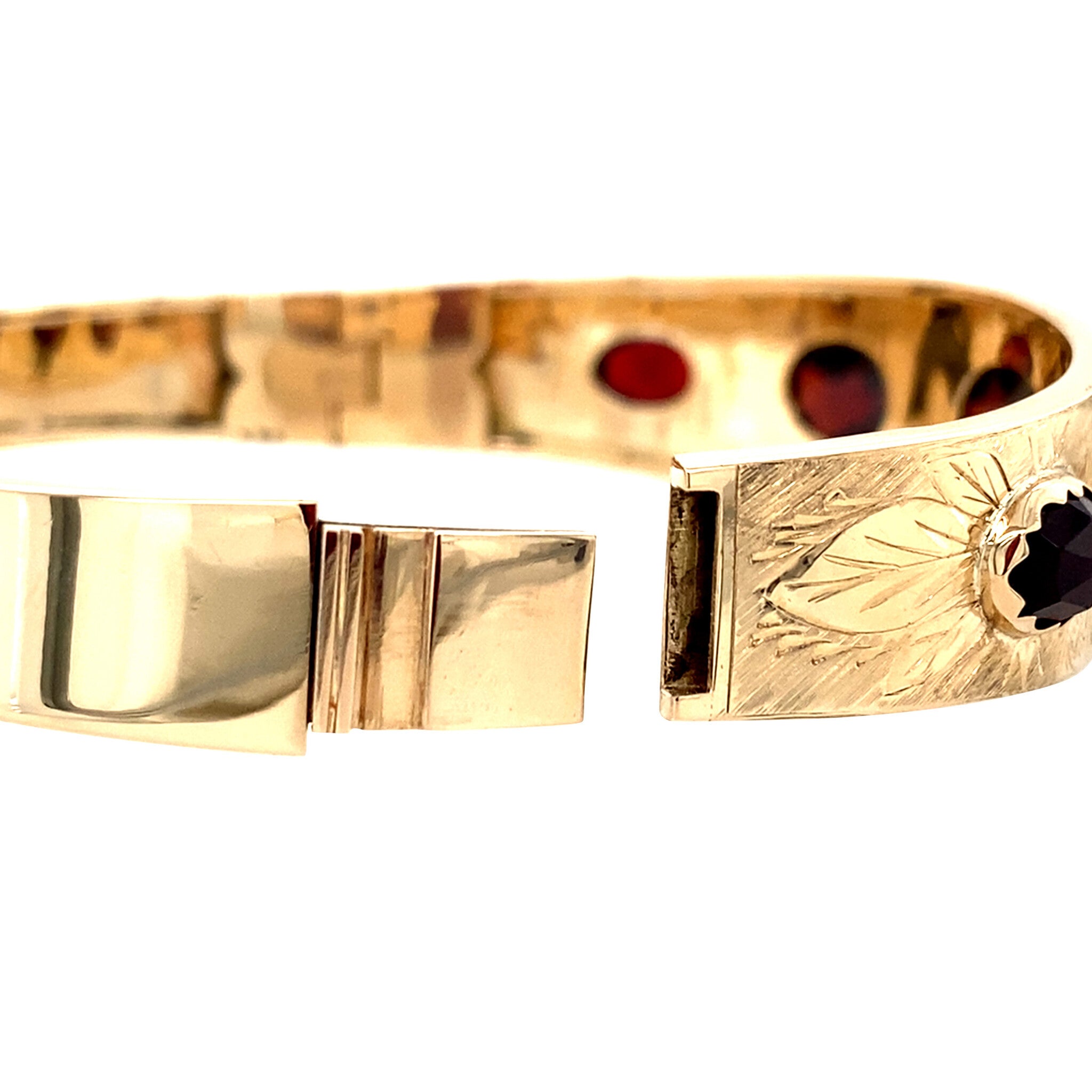 Gouden vintage bangle met granaat 14 krt