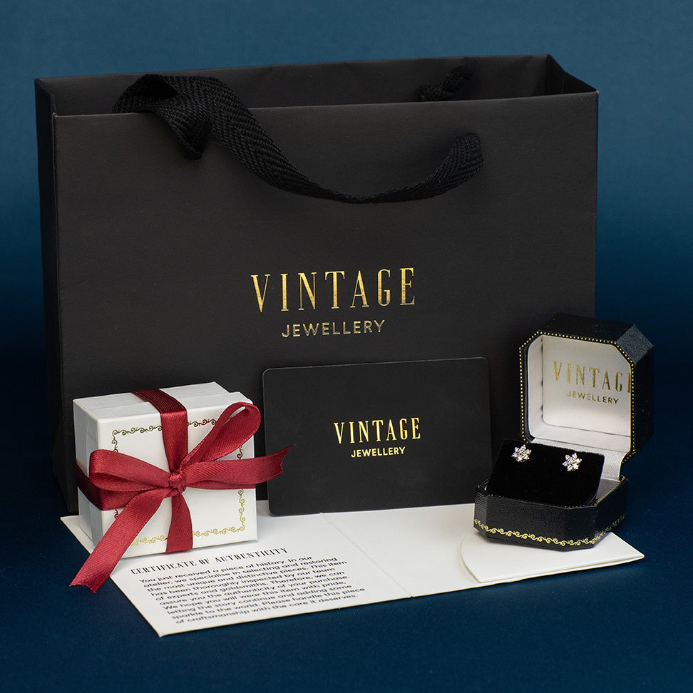 Gouden vintage entourage oorstekers met granaat 14 kt