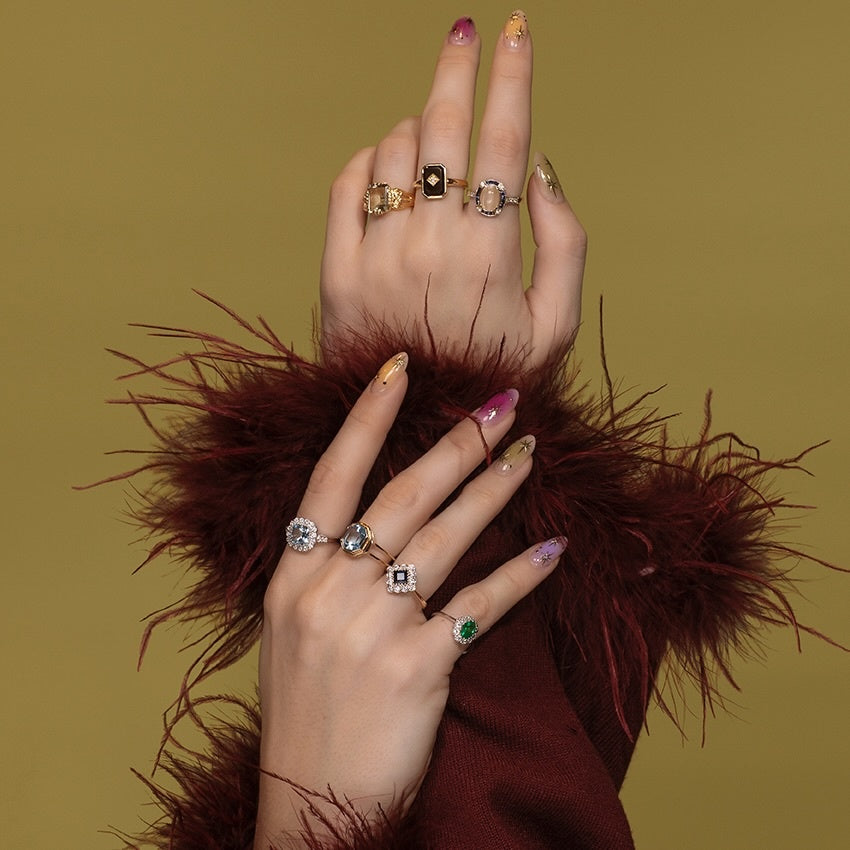 Gouden ring met blauwe topaas 14 kt