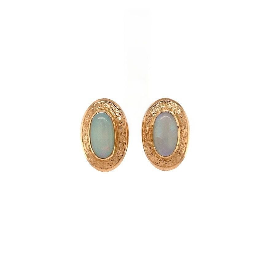 Rose gold ear clips with opal 18 krt