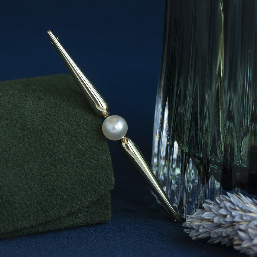 Vintage gouden broche met parel 14 krt