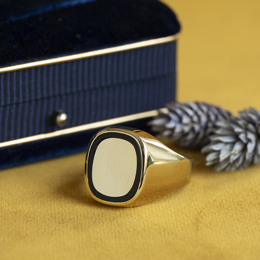 Gouden vintage zegelring met onyx 14 krt