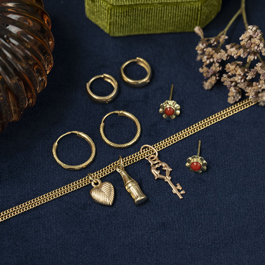 Gouden vintage fles hanger 14 kt