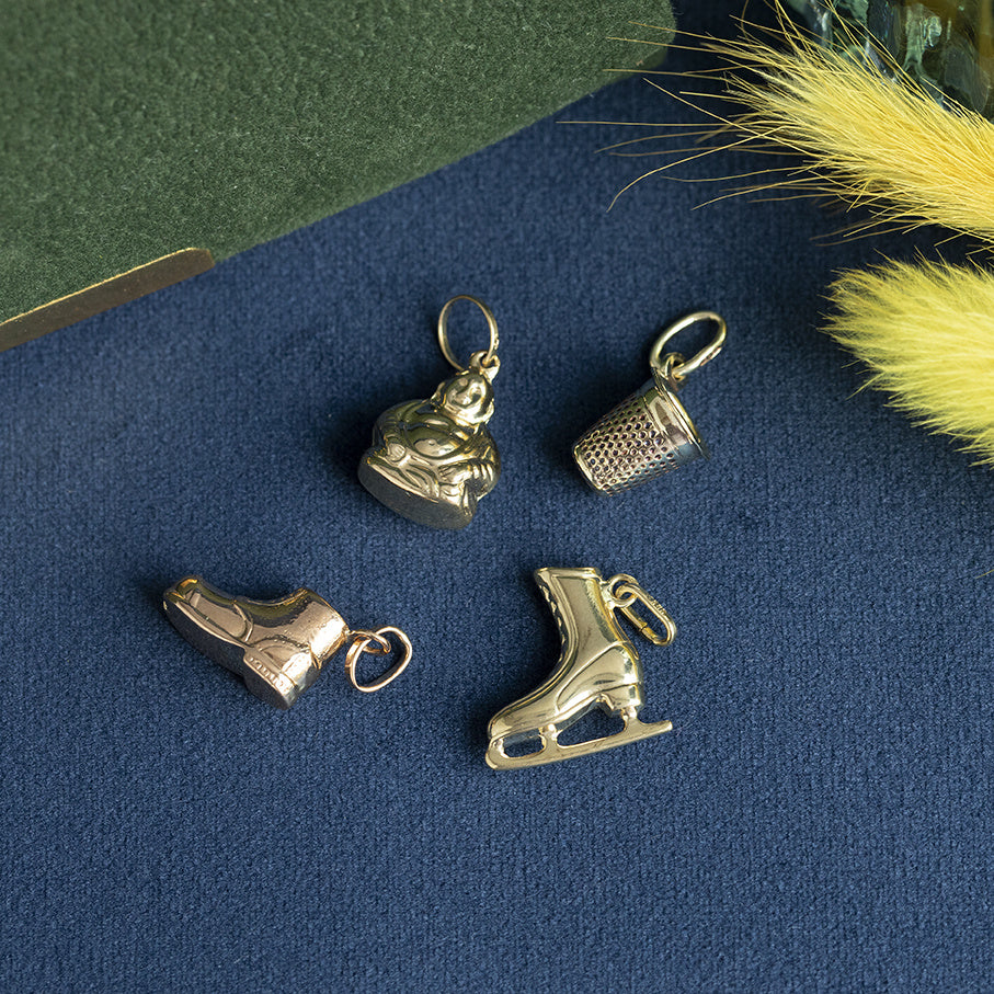 Gouden vintage schaats hanger 14 krt