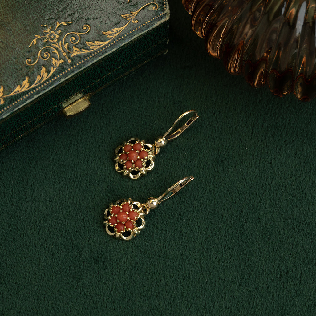 14 kt gold entourage dangle earrings with blood coral