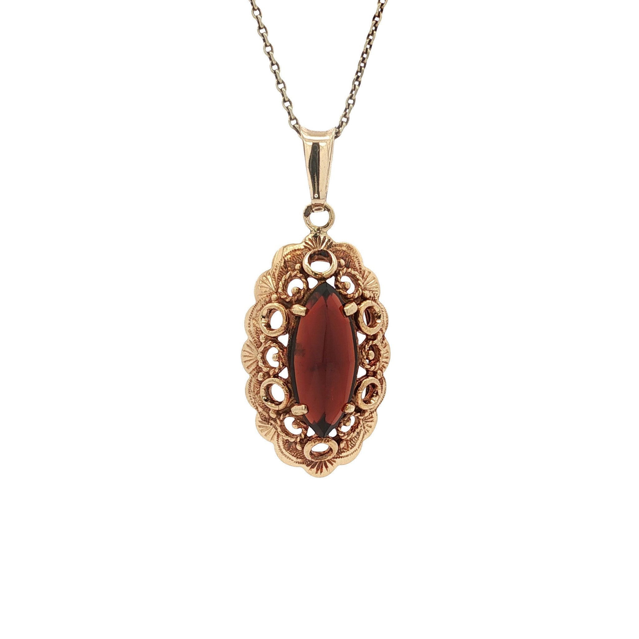 Gouden vintage hanger met granaat 14 kt