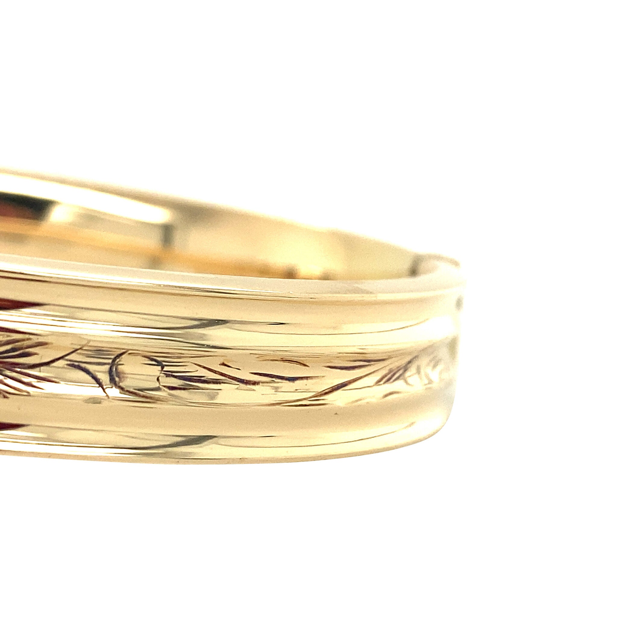 Gouden vintage bangle met gravure 14 krt