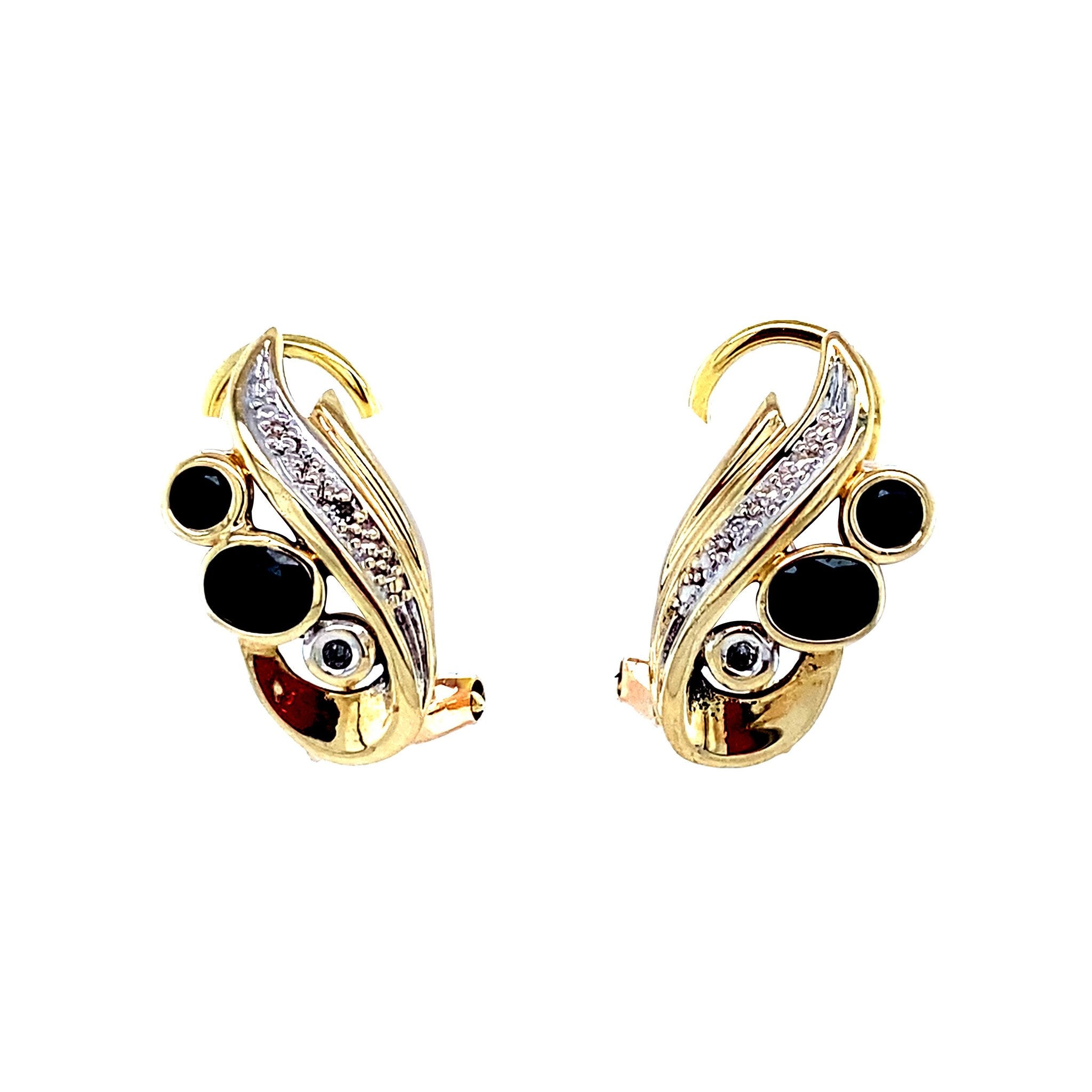 Gouden oorstekers met saffier en diamant 14 krt