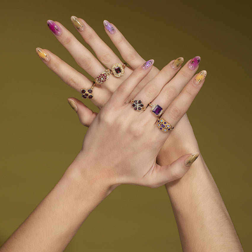 Gouden ring met granaat en parel 14 kt