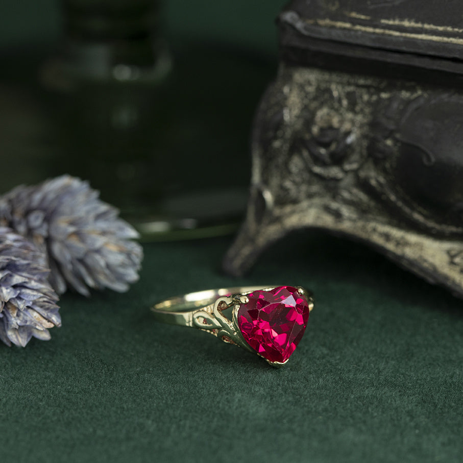 Vintage heart-shaped ring with ruby, 10 kt