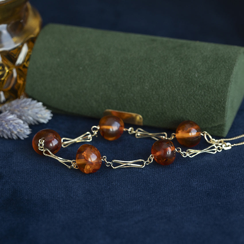 Gouden vintage armband met amber 14 kt