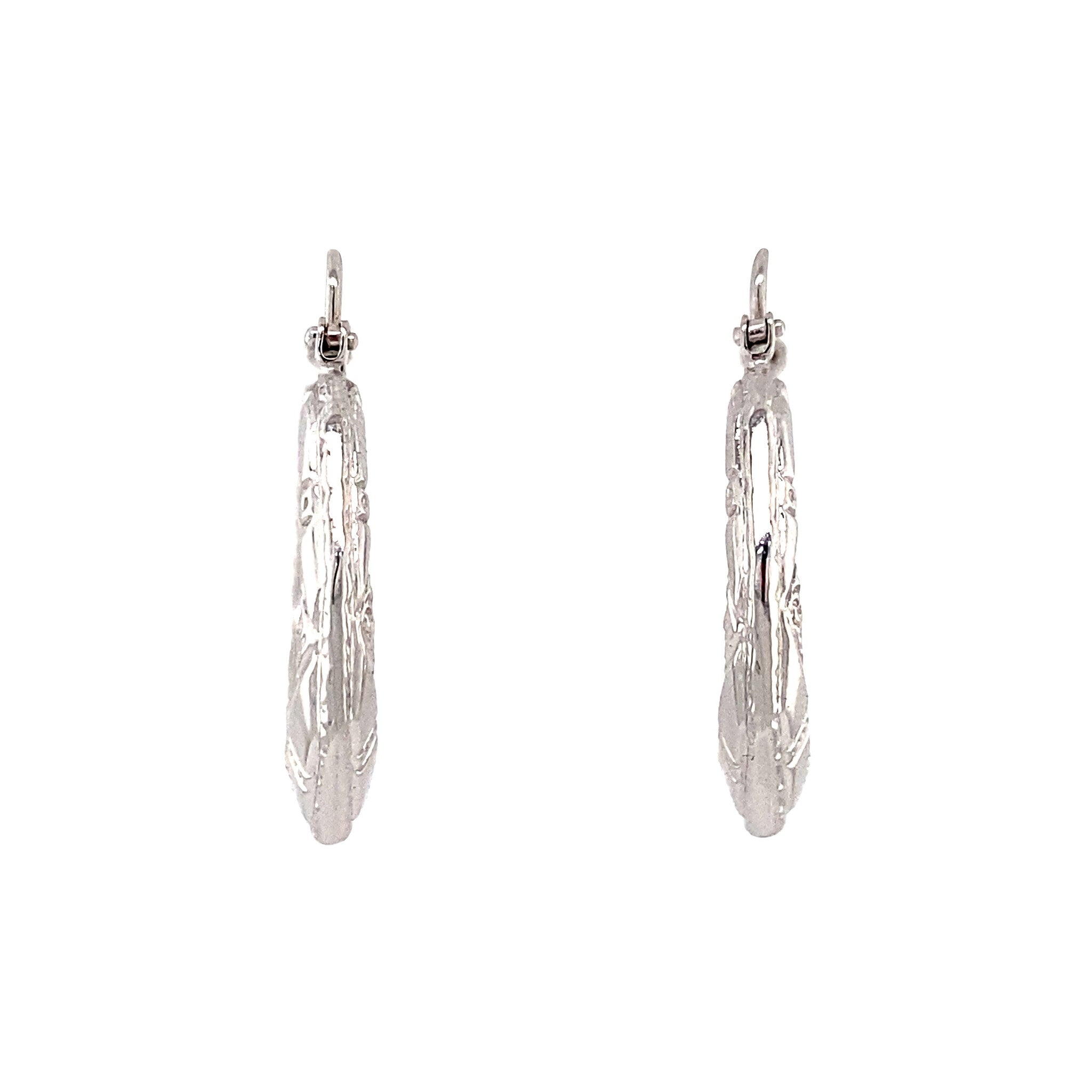 14 kt white gold fancy earrings