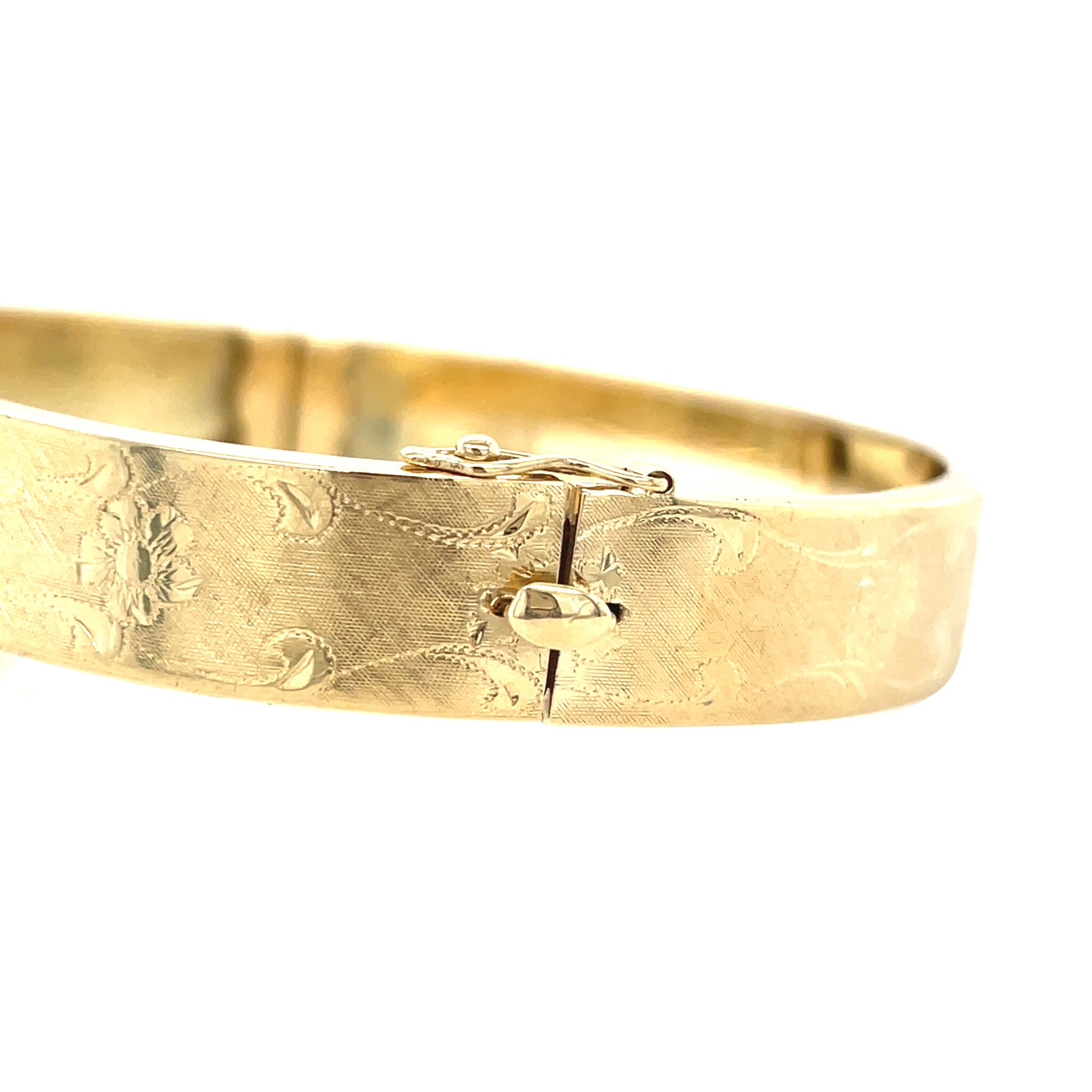 Gouden vintage bangle met gravure 14 krt