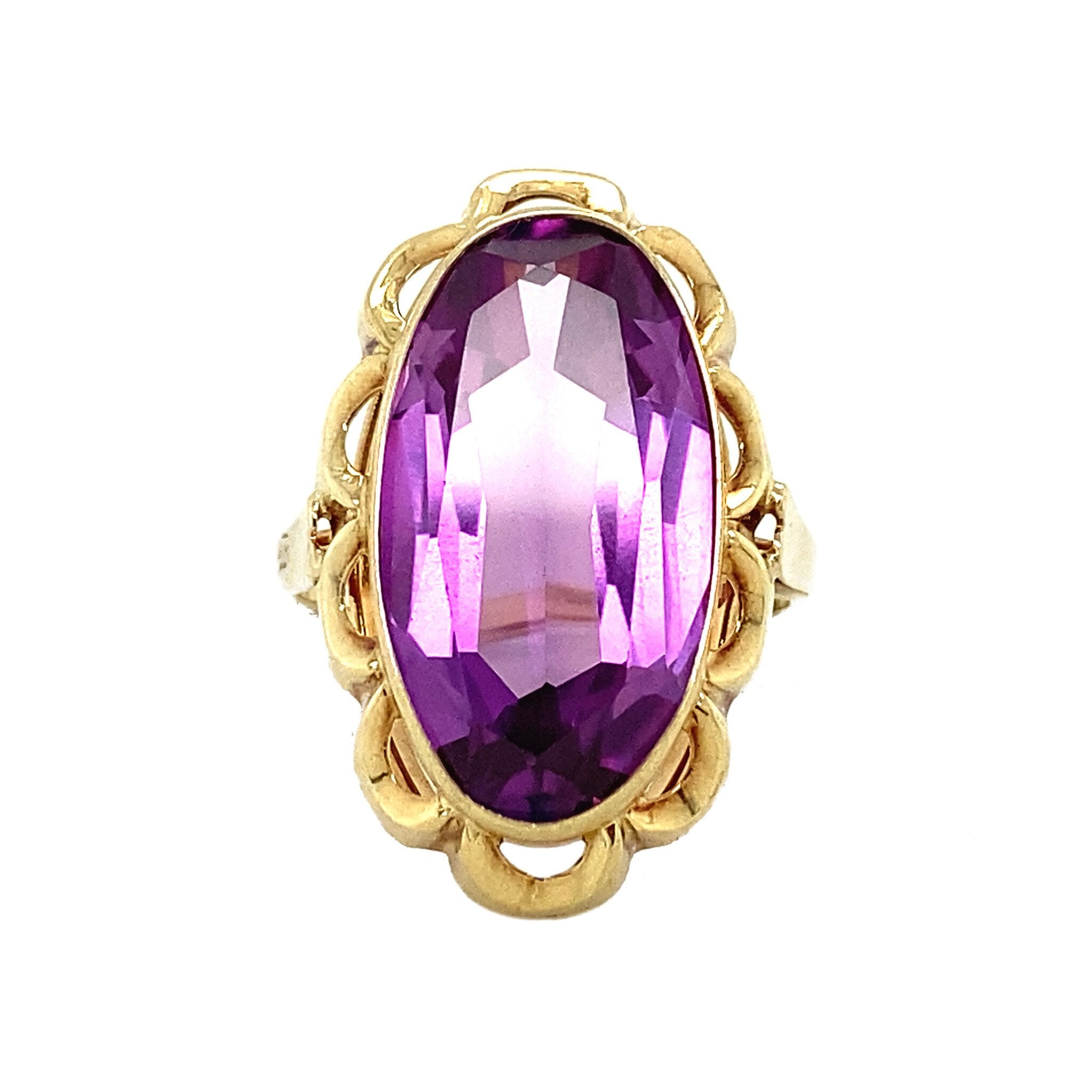 14 kt gold ring with purple sapphire