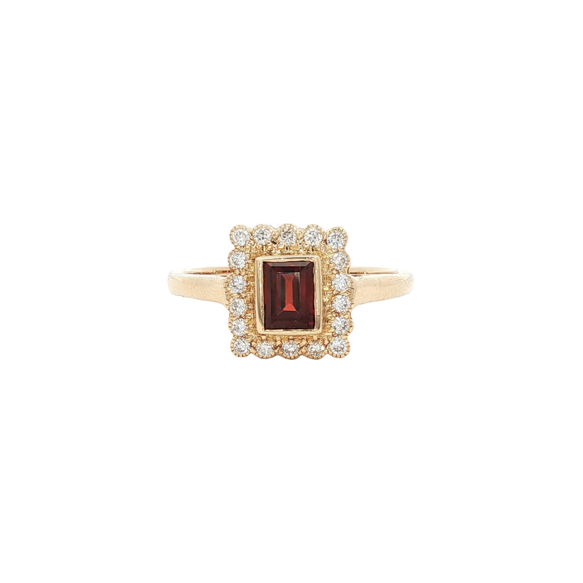 Gouden ring met granaat en diamant 14 kt