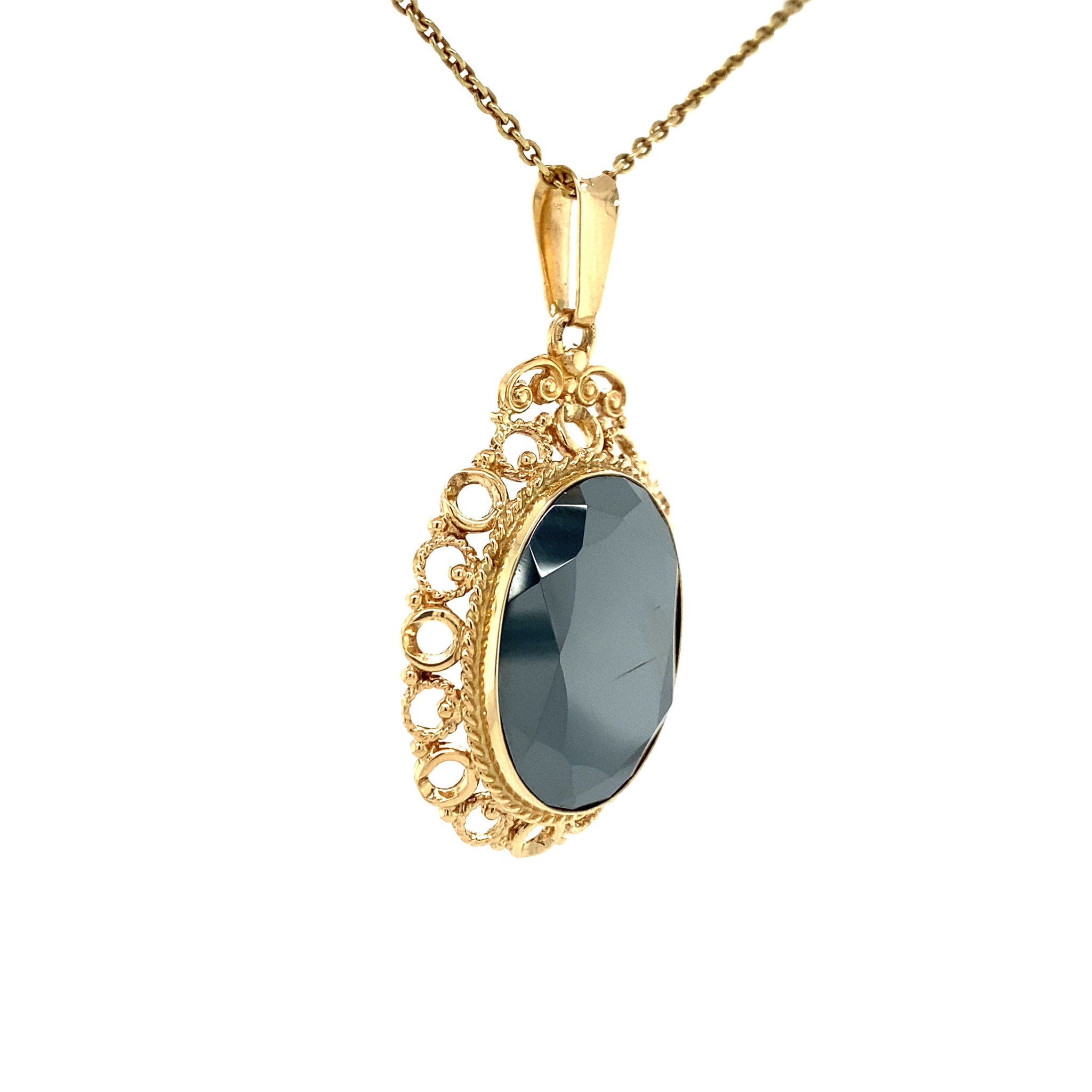 Gold pendant with hematite 14 kt