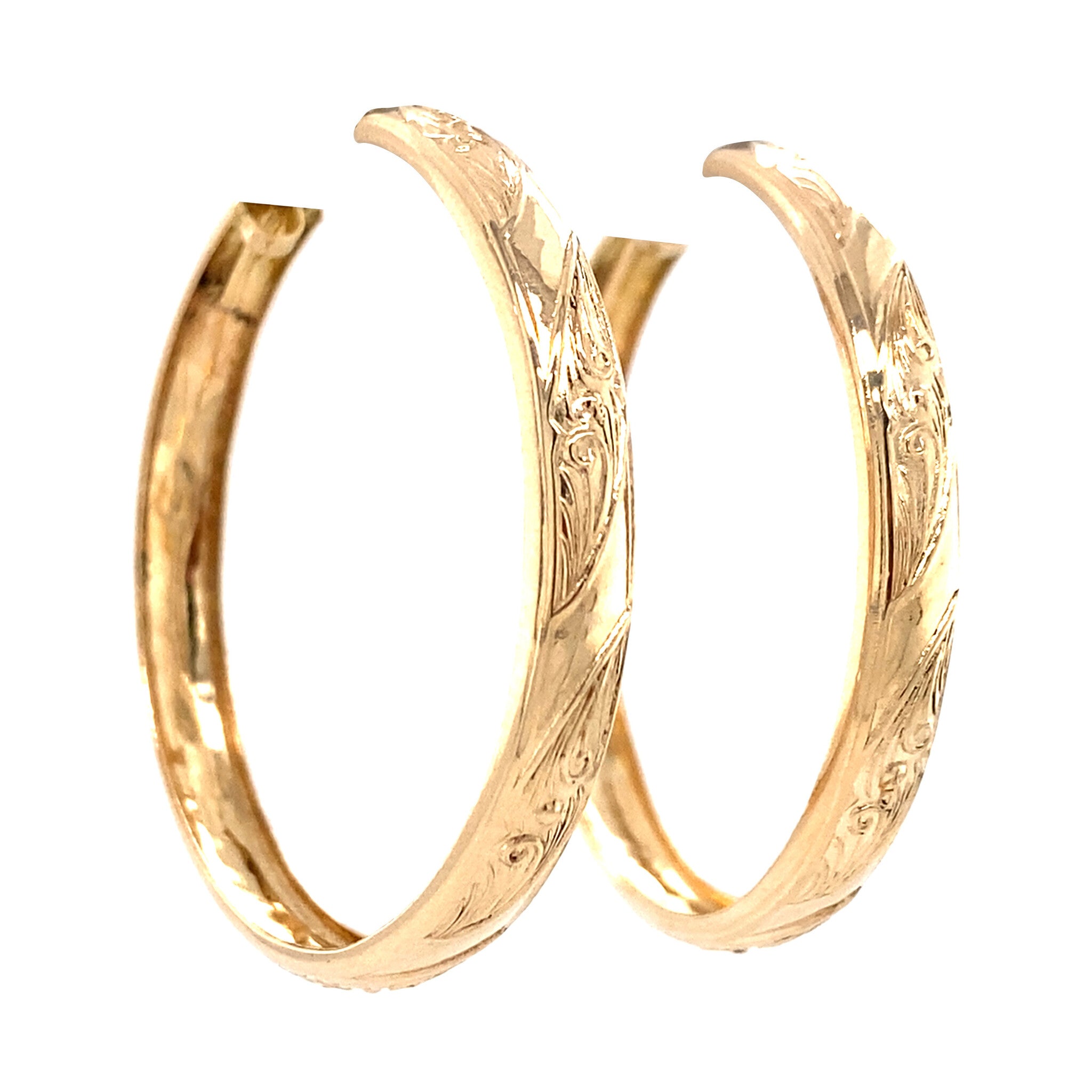 Gouden fantasie oorringen 18 krt