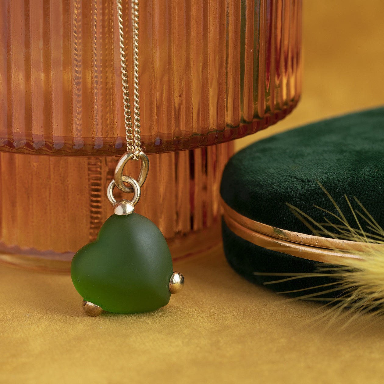 14 kt gold heart pendant with green sea glass