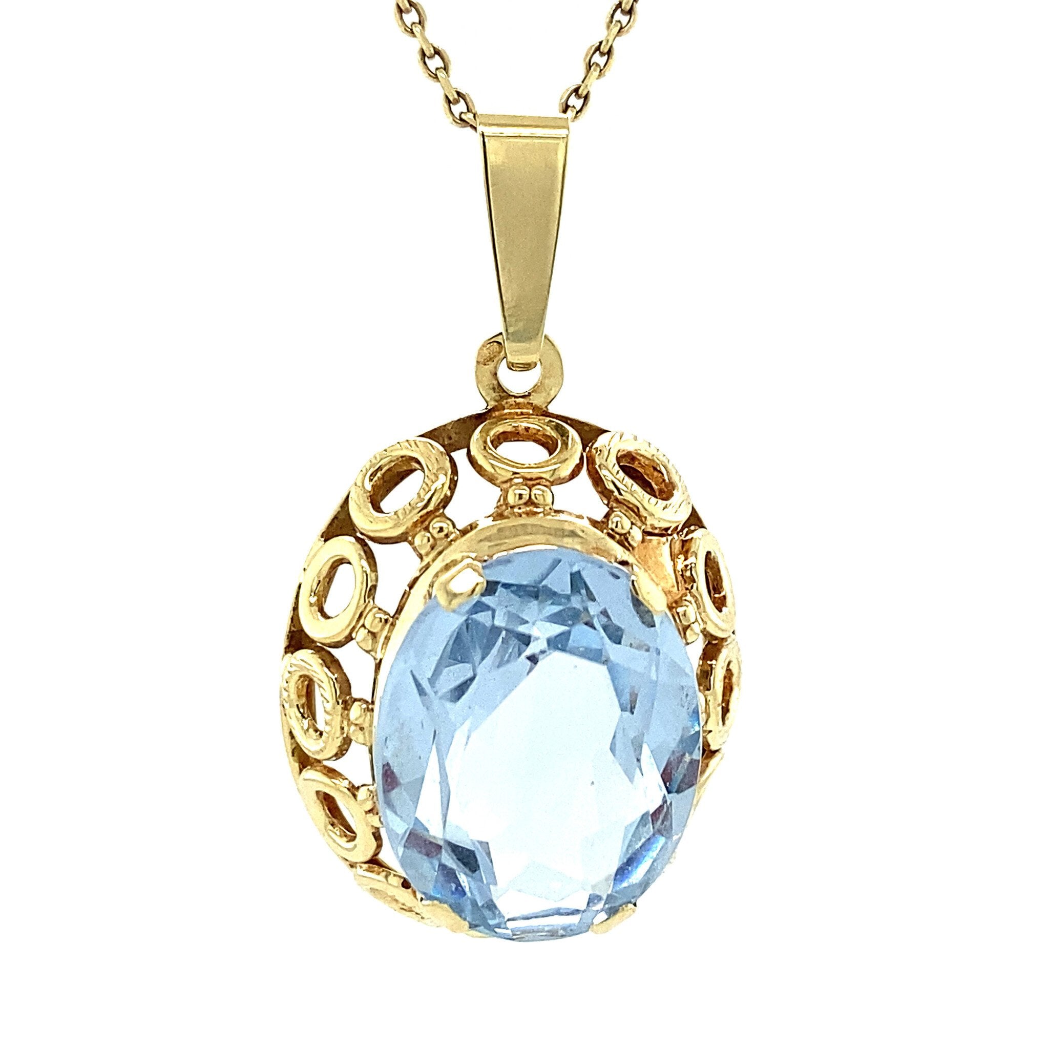 Gouden hanger met blauwe spinel 14 krt