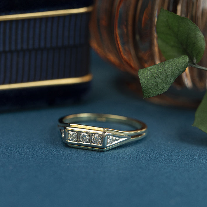 14 kt gold trefoil ring with diamond