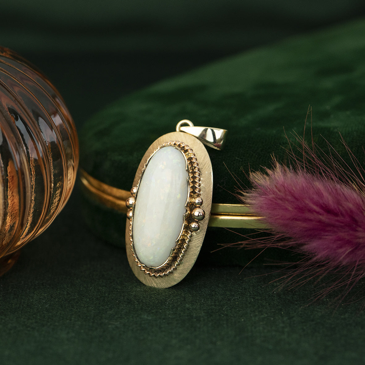 Gouden hanger met opaal 14 krt