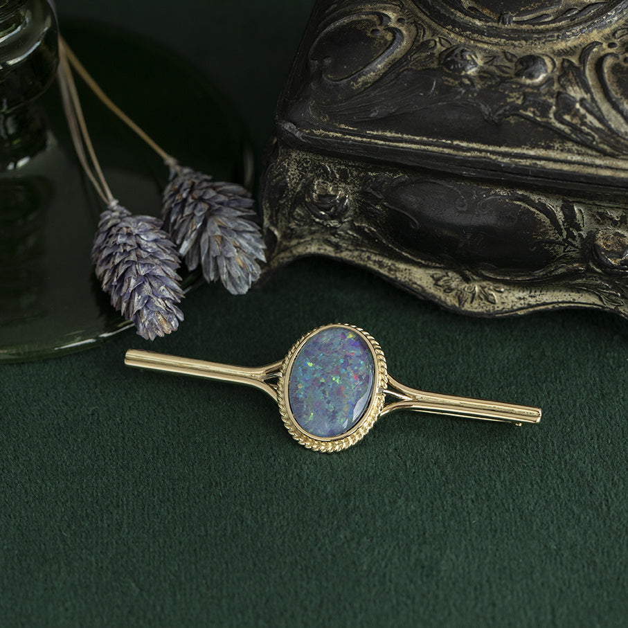 Gouden vintage broche met opaal triplet 14 krt