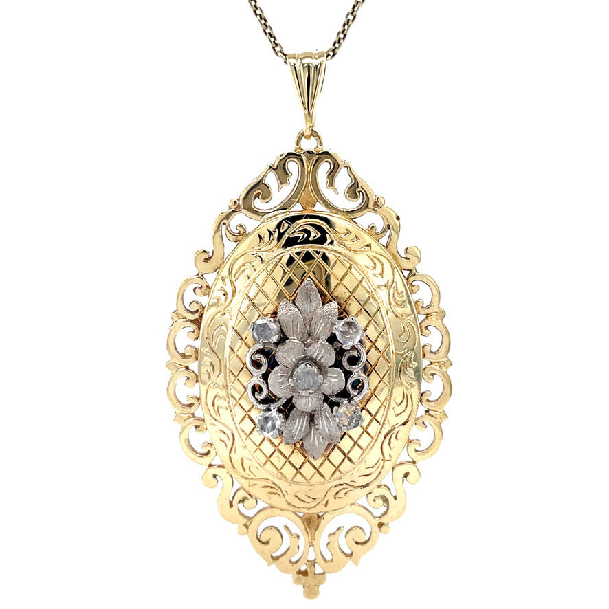 Vintage gold pendant with 14 kt diamond