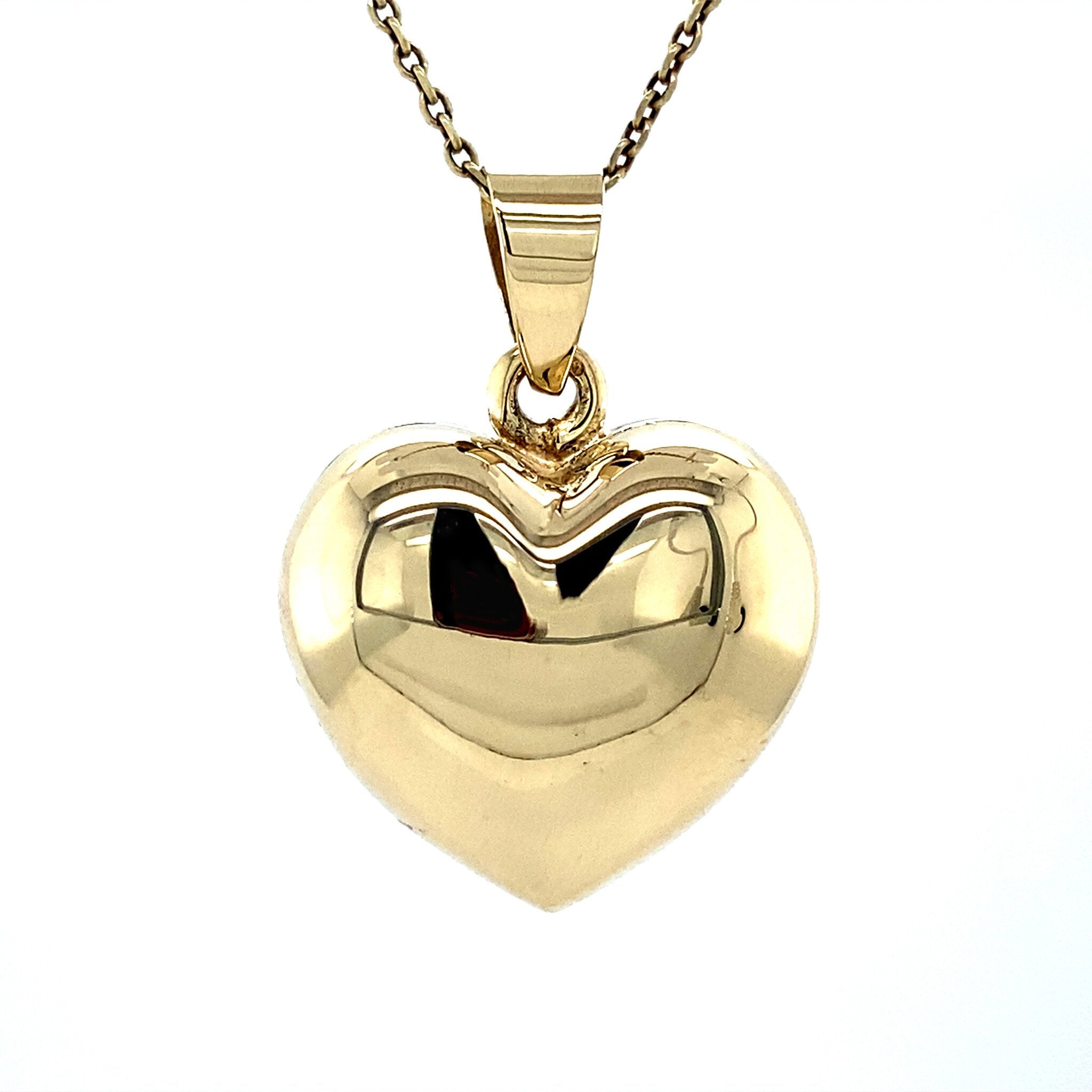 14 kt gold heart medallion