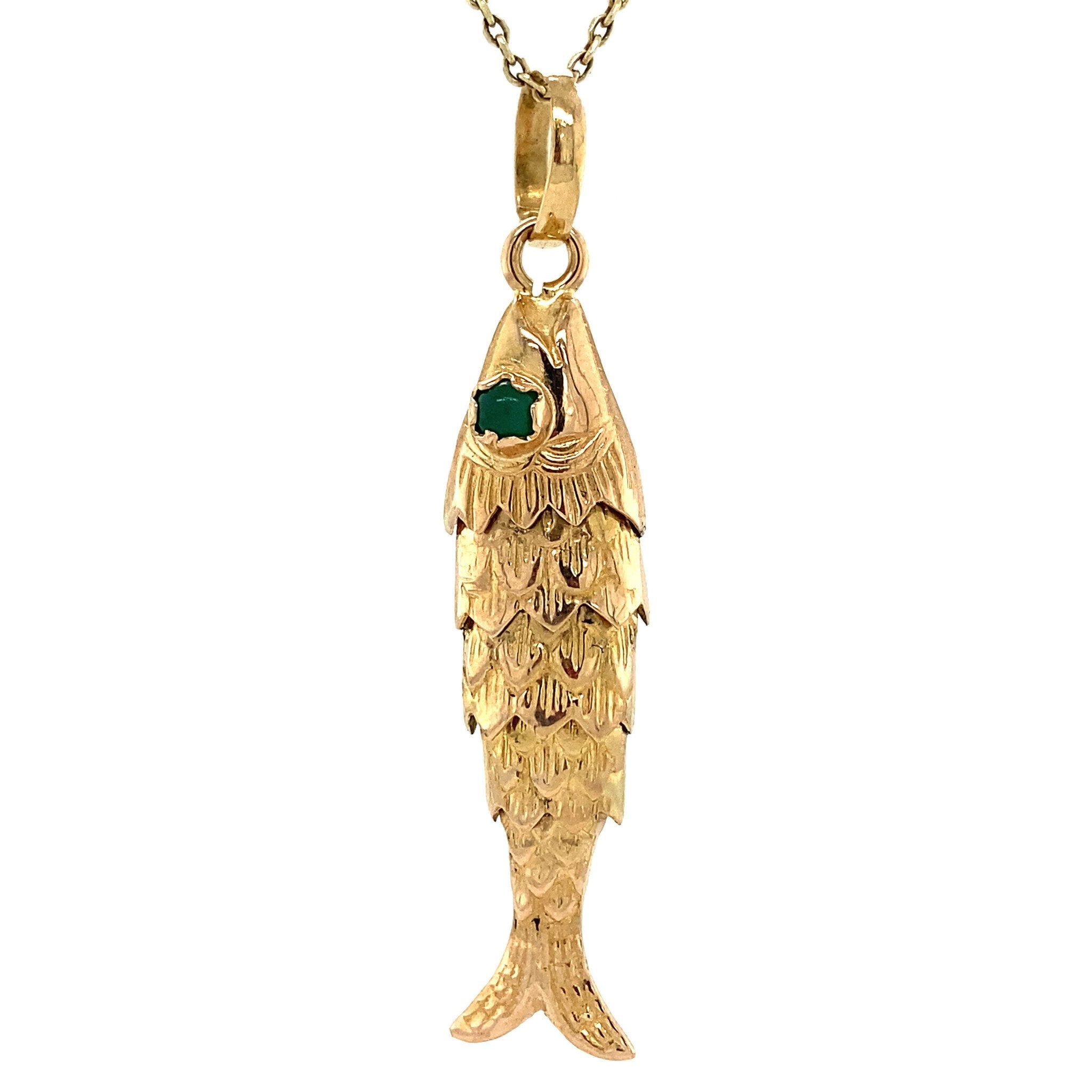 18 kt gold fish pendant with colored gemstone