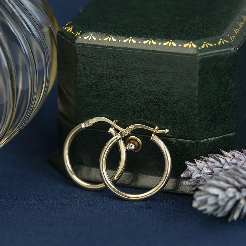 Gouden vintage gladde oorringen 18 kt