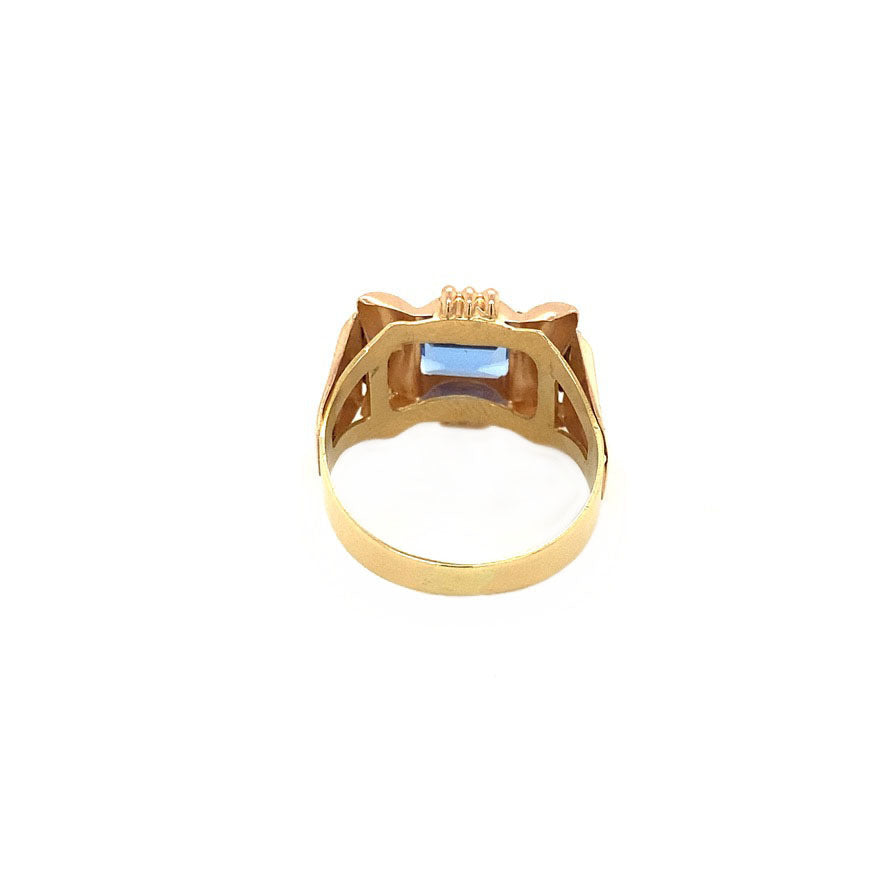 Gouden retro ring met blauwe spinel en zirkonia 18 krt
