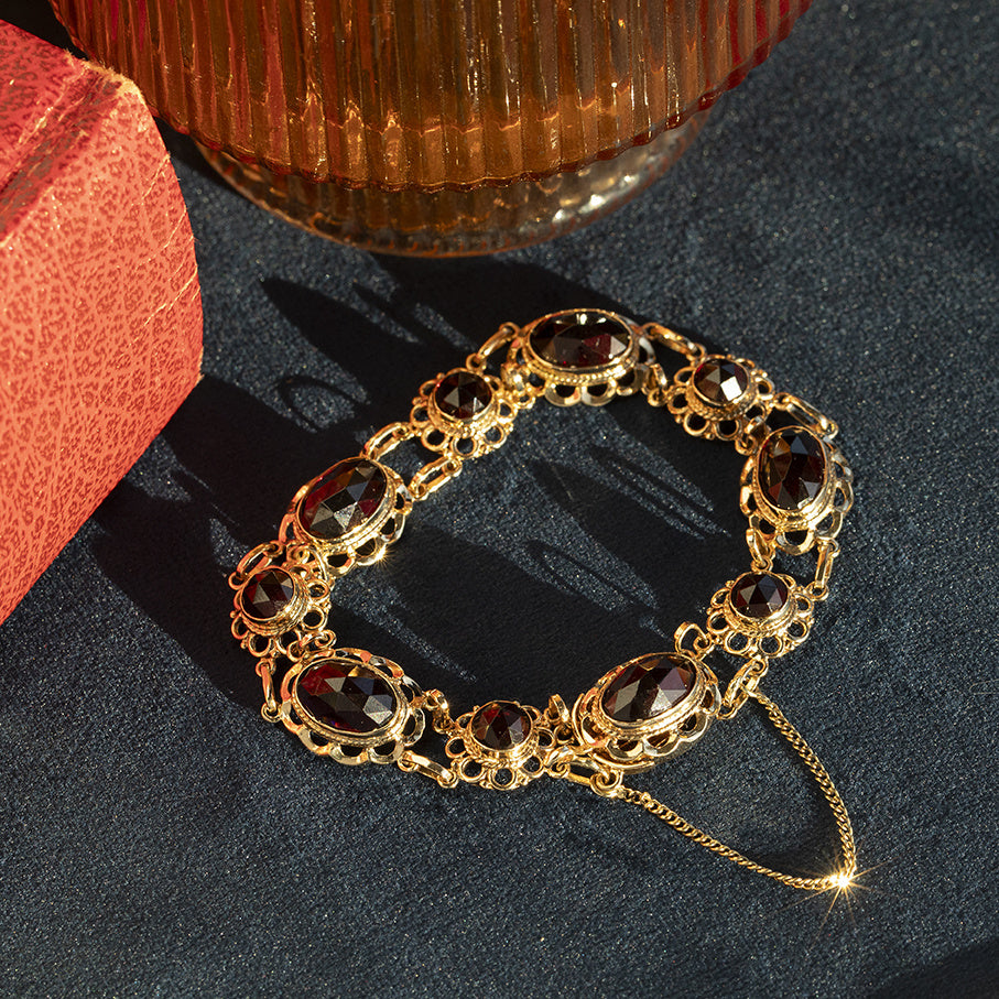 Gouden vintage bootjes armband met granaat 14 kt