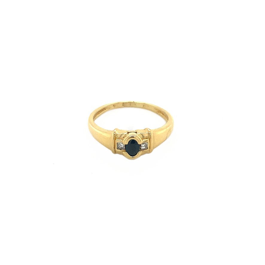 18-karat gold ring with sapphire and diamond
