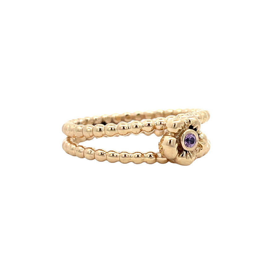Vintage 14 kt gold flower ring with sapphire.