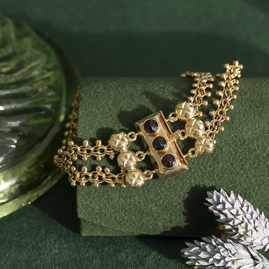 Gouden vintage armband met granaat 14 kt