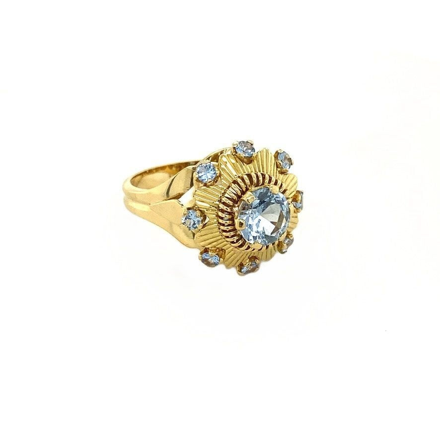 Gold ring with blue spinel 18 crt