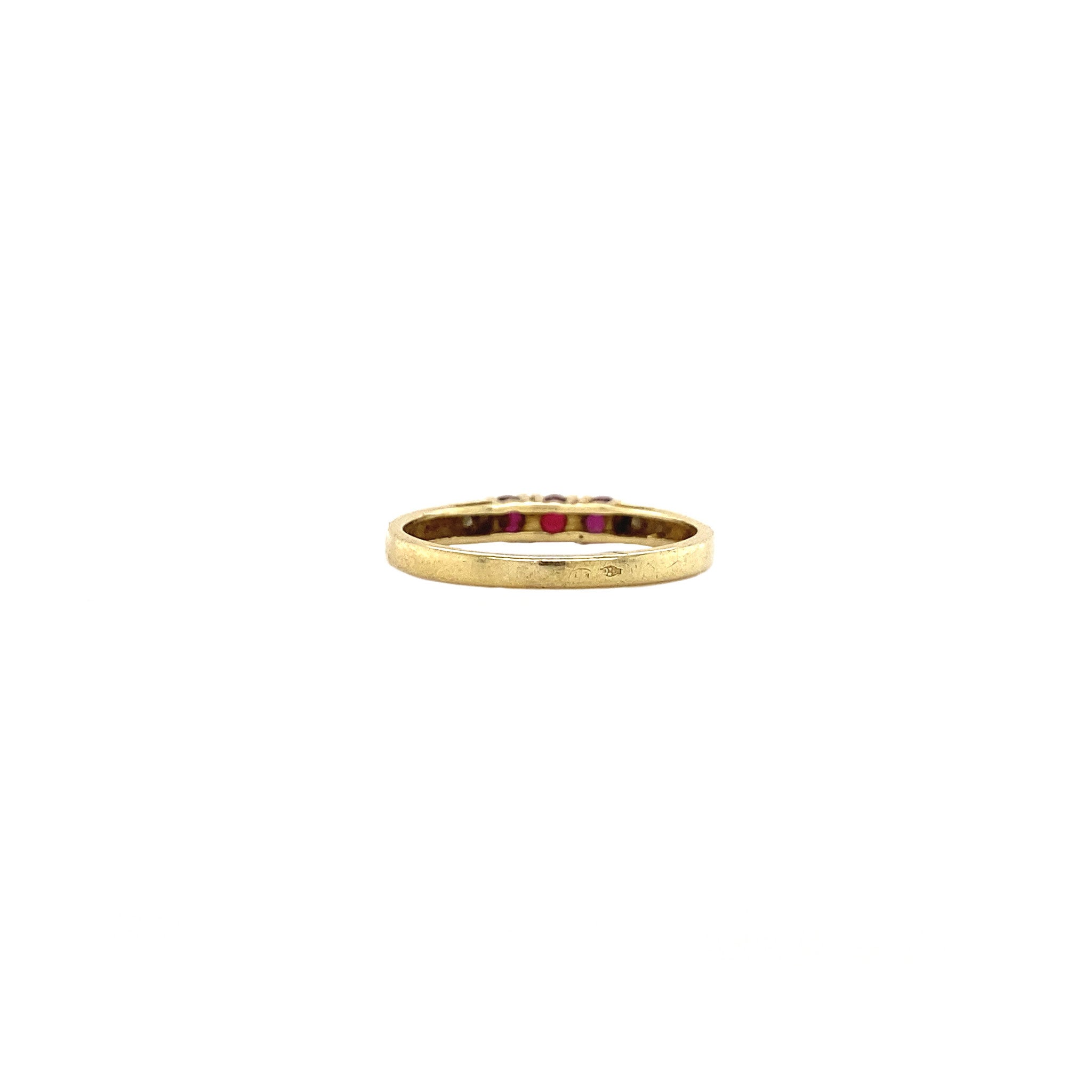 14 kt gold ring with a ruby and a diamond