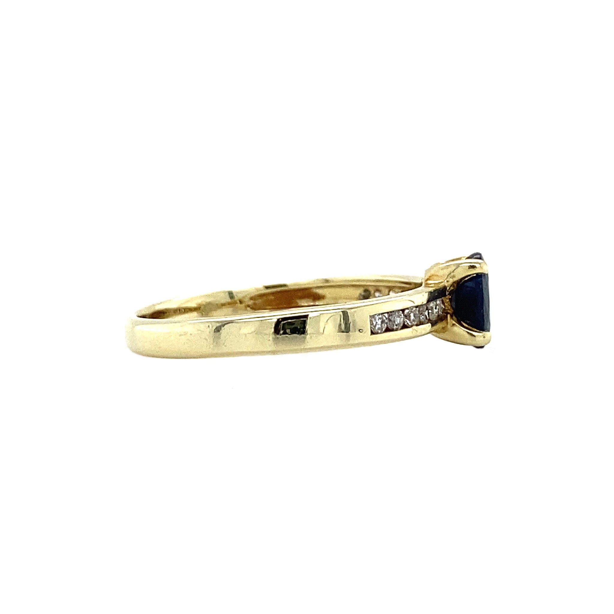 Gouden ring met saffier en diamant 14 krt