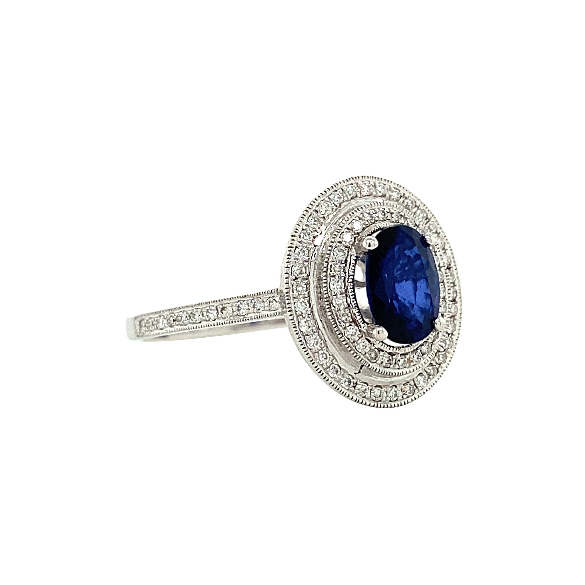 Witgouden entourage ring met saffier en diamant 18 krt