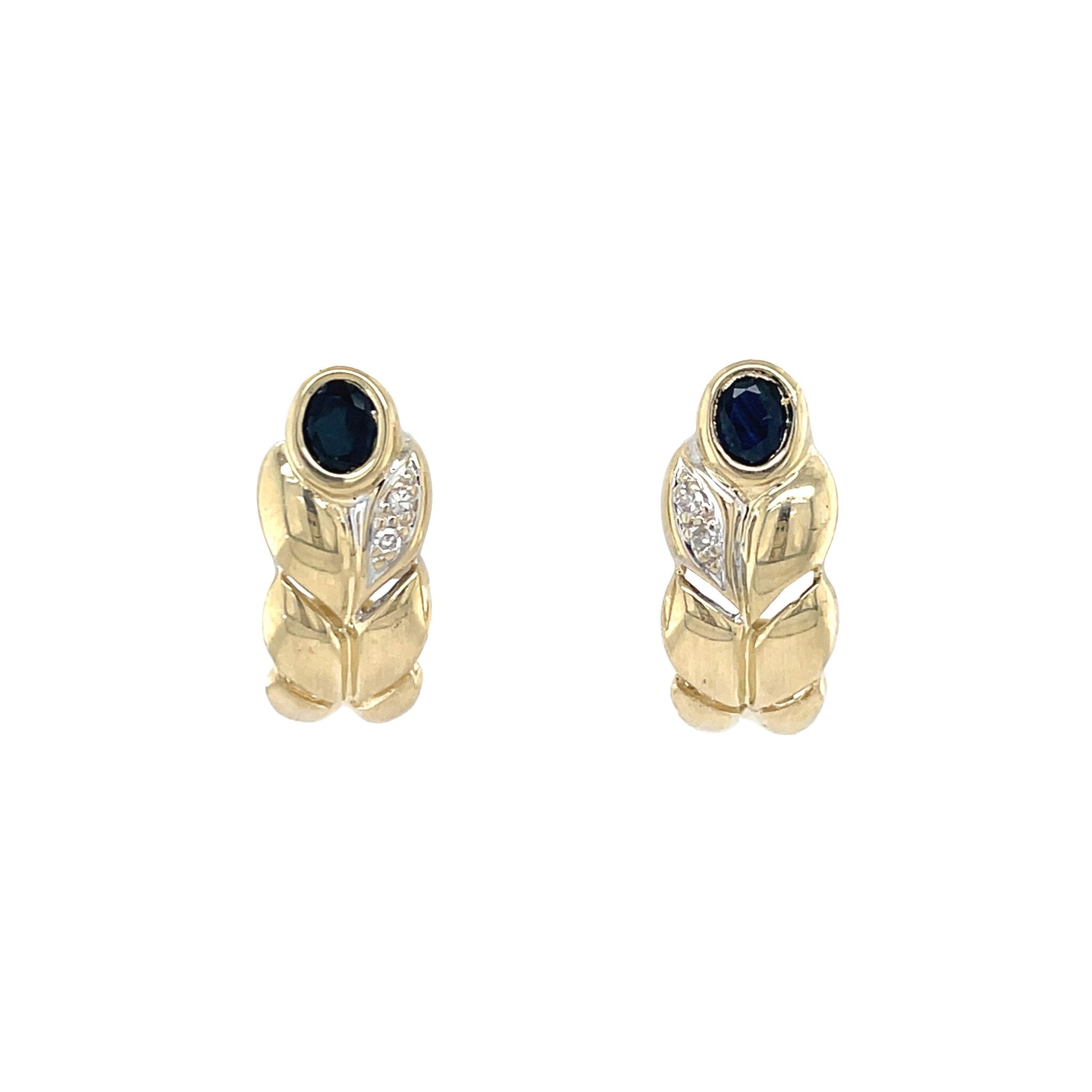 Gouden vintage oorstekers met saffier en diamant 14 krt