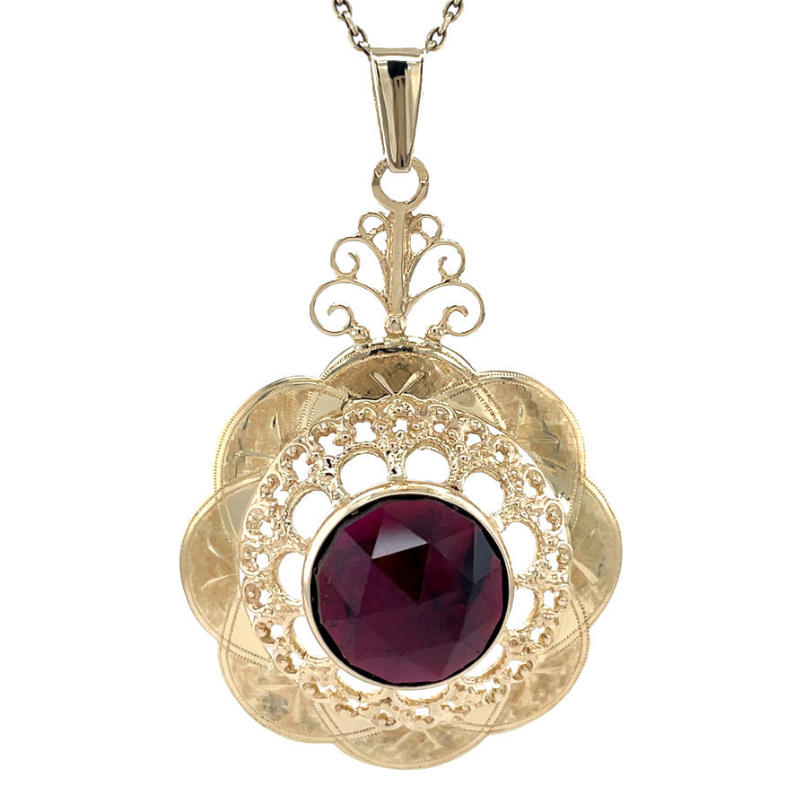 Gouden vintage hanger met granaat 14 krt