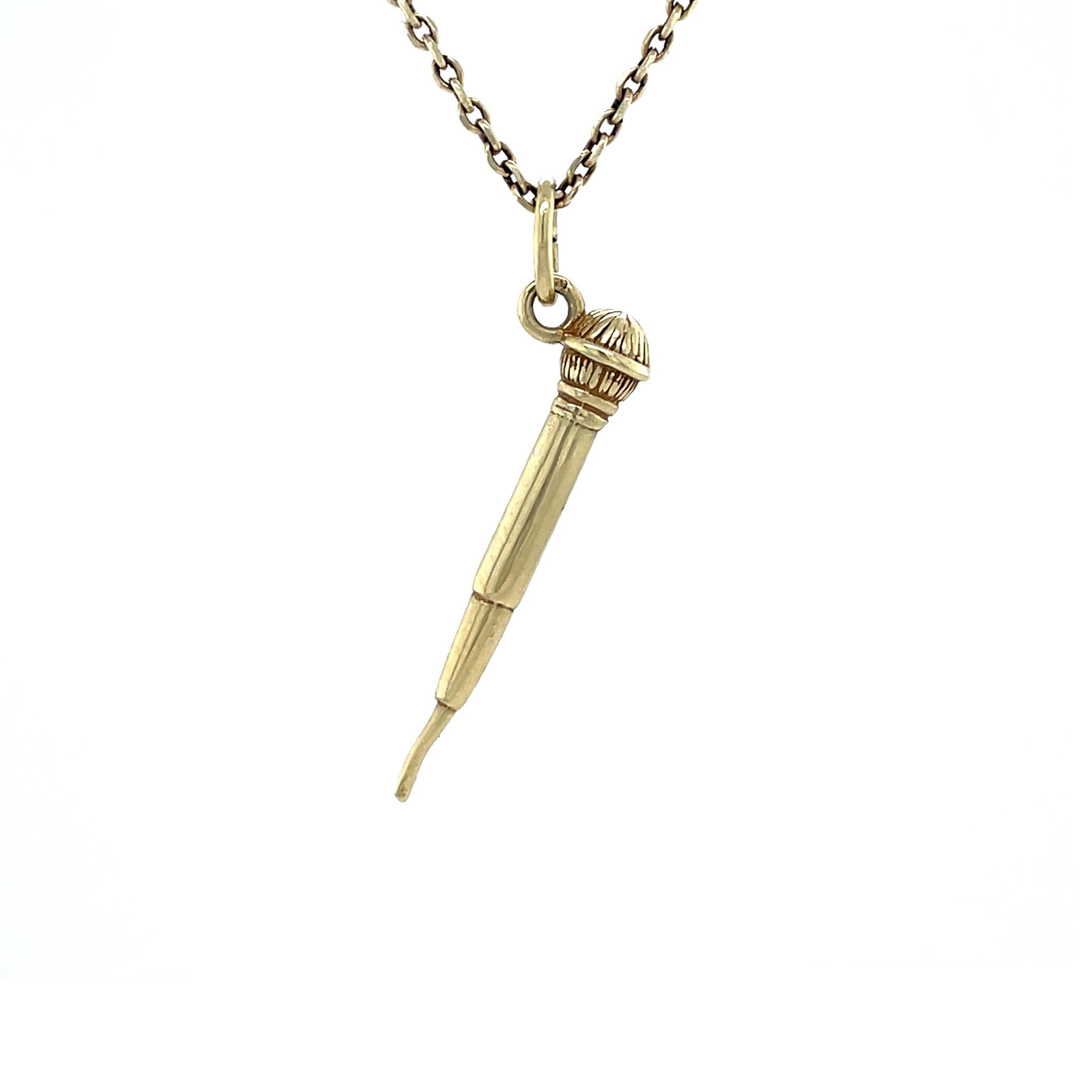 14 kt vintage gold microphone pendant